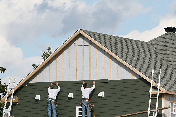 Professional Siding technician working in Syosset, NY